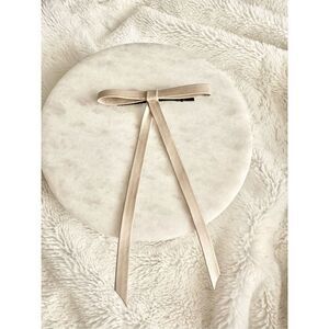 Cream color mini leather hair bow clip